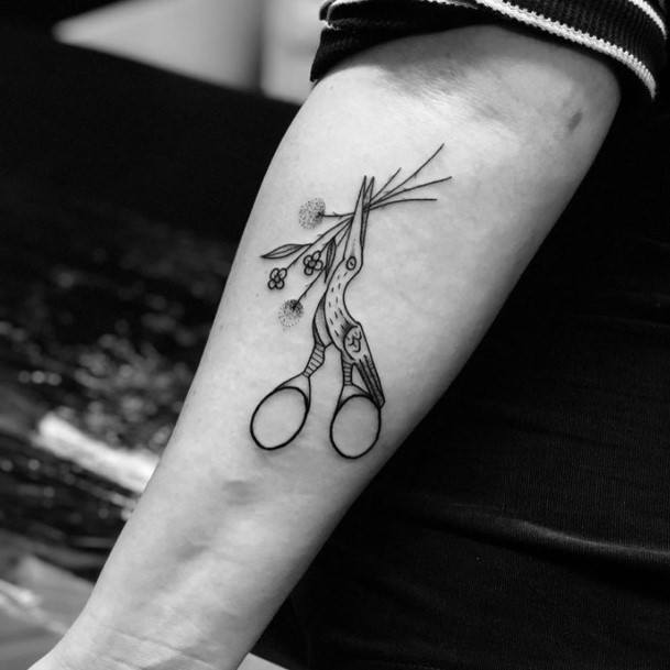 Female Sewing Tattoo On Woman