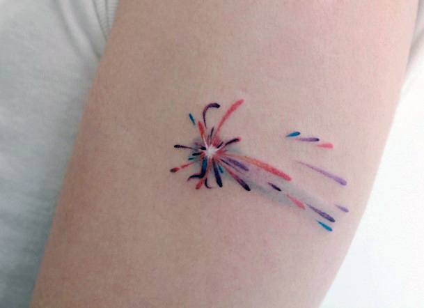 Female Shooting Star Tattoo On Woman