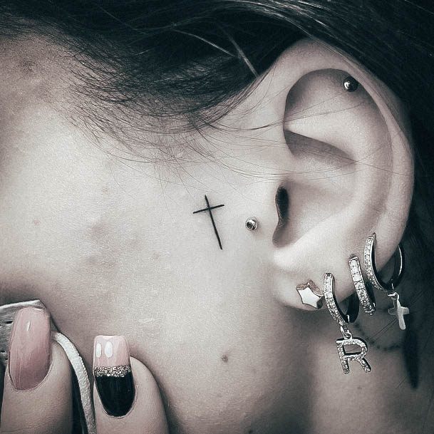 Female Small Cross Tattoo On Woman