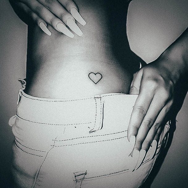 Female Small Heart Tattoo On Woman