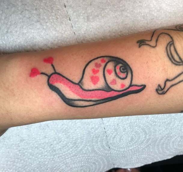 Female Snail Tattoo On Woman