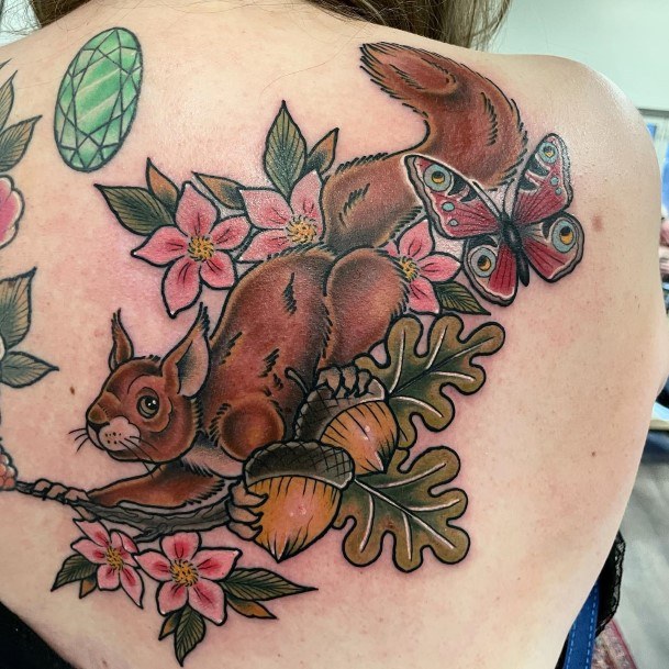 Female Squirrel Tattoo On Woman