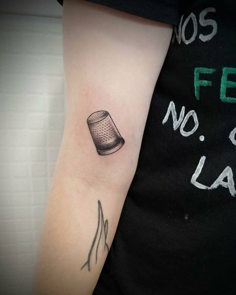 Female Thimble Tattoos