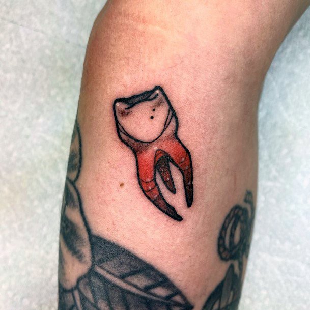 Female Tooth Tattoos