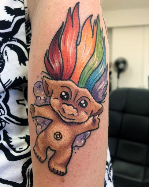 Female Troll Doll Tattoo On Woman