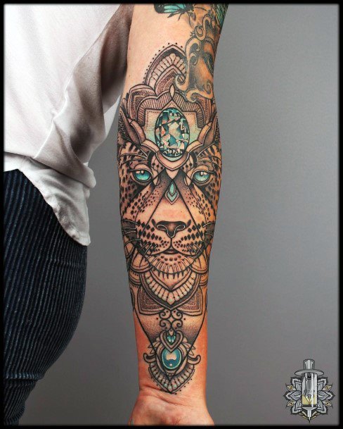 Female Turquoise Tattoo On Woman