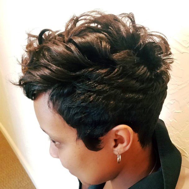 Female With Edgy Haircut With Razor Cut Pixie