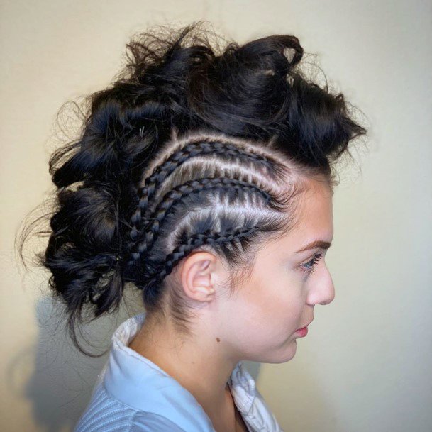 Female With Hardcore Corn Rows With A Messy Overlayed Mohawk Hairstyle