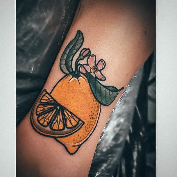 Female With Lemon Tattoo