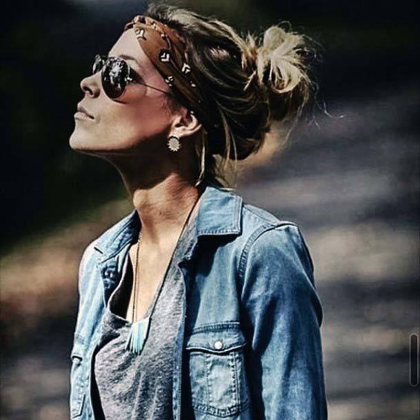 Female With Messy Bun And Brown Headband