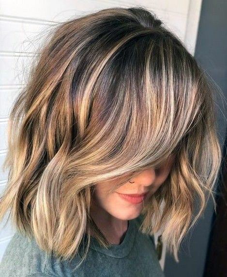 Female With Sandy Brown Wavy Hair And Side Part Airy Styles