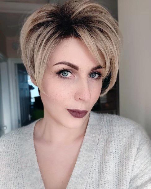 Female With Short Hairstyle Blonde Coloring With Dark Dramatic Roots