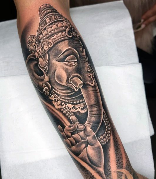 Females Ganesha Tattoos