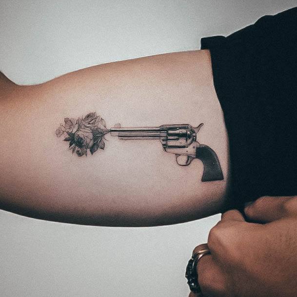 Females Gun Tattoos Flowers In Barrel Arm