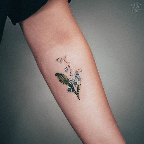 Females Lily Of The Valley Tattoos