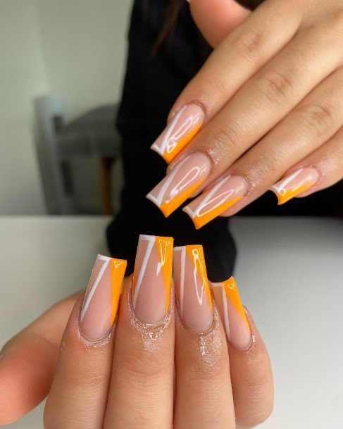 Females Orange And White Nails