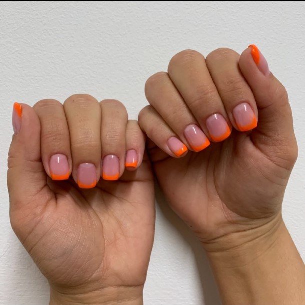 Females Orange French Tip Nails