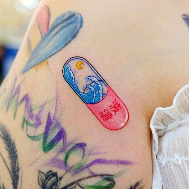 Females Pill Tattoos