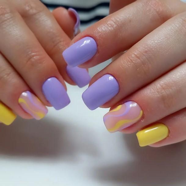 Females Purple And Yellow Nails