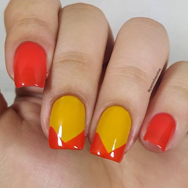 Females Red And Yellow Nails