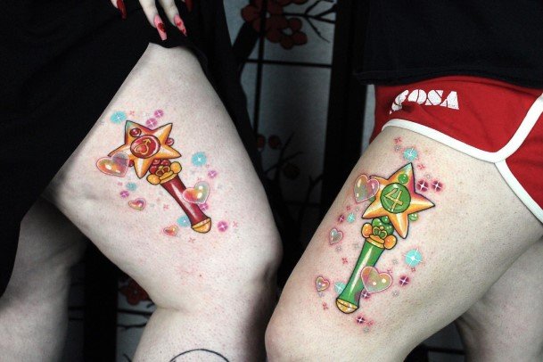 Females Wand Tattoos