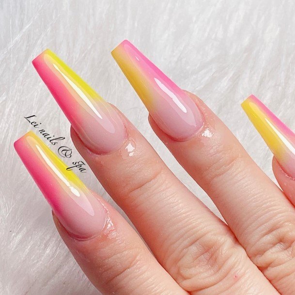 Females Yellow And Pink Nails