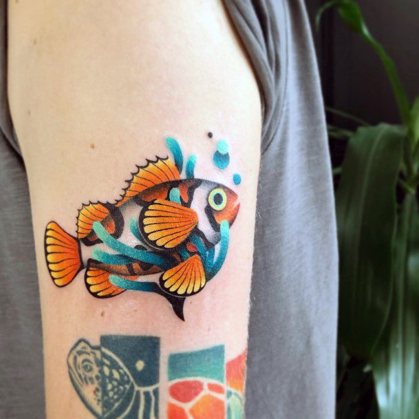 Feminine Clown Fish Tattoo Designs For Women