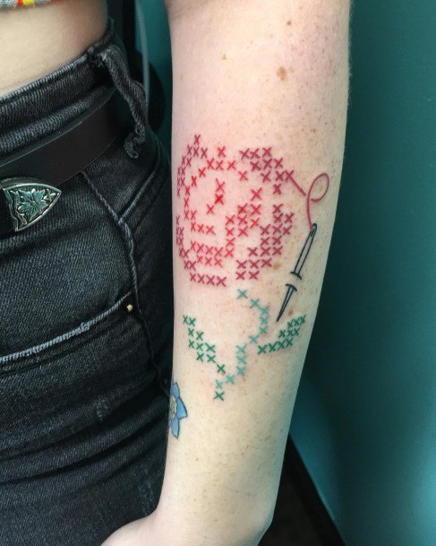 Feminine Cross Stitch Tattoo Designs For Women