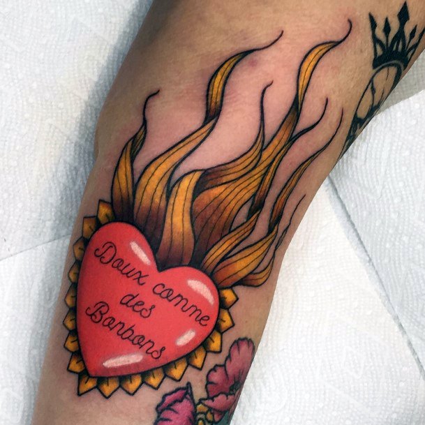 Feminine Girls Flaming Heart Tattoo Designs