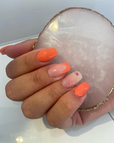 Feminine Girls Orange And White Nail Designs