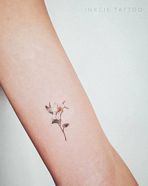 Feminine Lily Tattoo Designs For Women