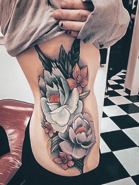Feminine Womens Ribs Tattoo White Flowers