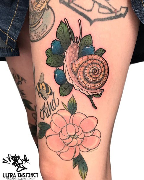 Feminine Womens Snail Tattoo