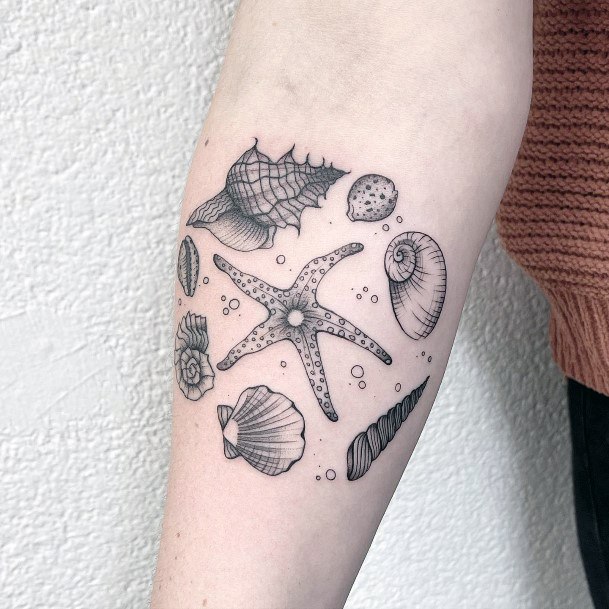 Feminine Womens Starfish Tattoo
