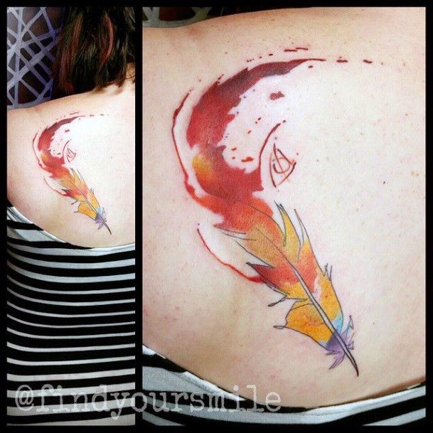 Fiery Yellow Feather Tattoo Womens Back