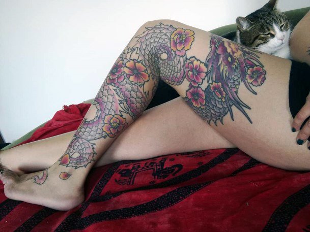 Fine And Strong Dragon Tattoo With Colors Womens Legs