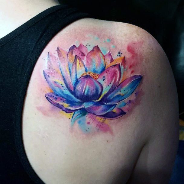 Flaming Colored Lotus Flower Tattoo Womens Back