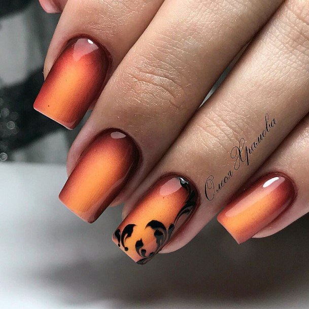 Flawless Black And Orange Fall Ombre Nails For Ladies
