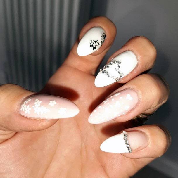 Floral Accessories And Crystals On White Gel Nails Women