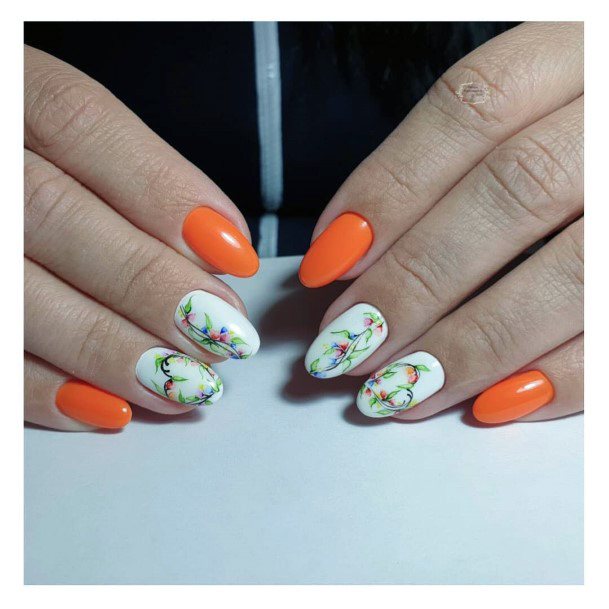 Floral Art On Orange And White Nails