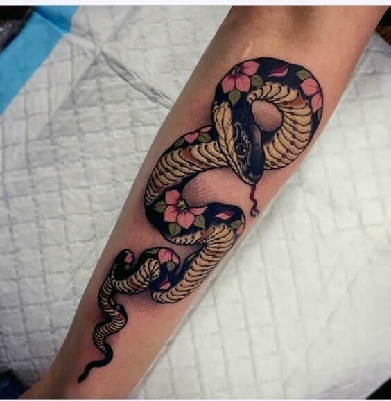 Floral Art On Snake Skin Tattoo For Women
