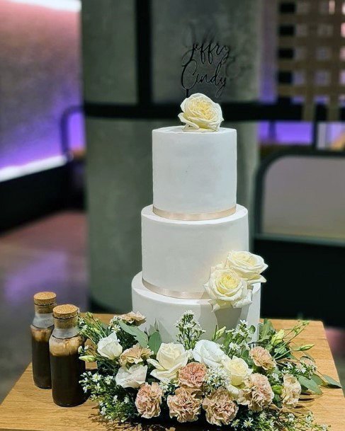 Flowers Adorned 3 Tier Wedding Cake For Women