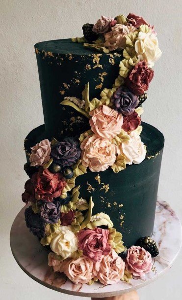Flowers Adorned On Black Wedding Cake