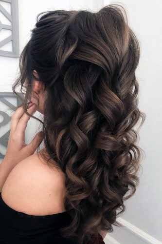 Flowing Dark Curls Hairstyle Women