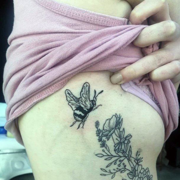 Flying Bee Over Flowers Tattoo Womens Torso Design