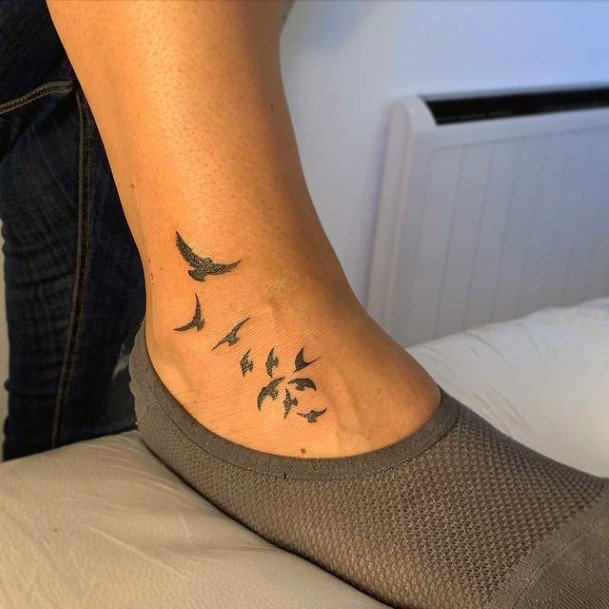 Flying Black Birds Womens Feet Tattoo