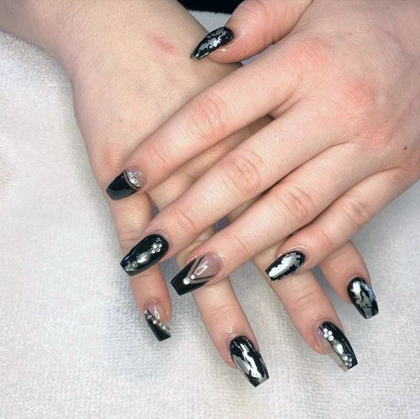 Foils Of Silver On Black Nails Women