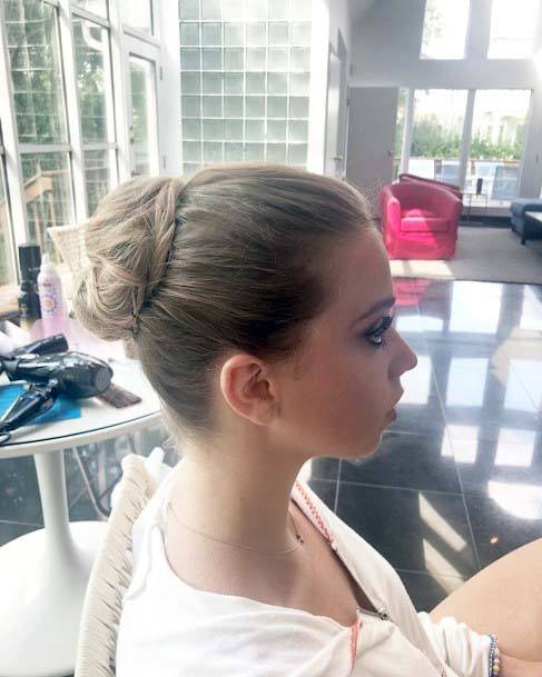 Formal Straight Back Tight Centered Bun On Woman