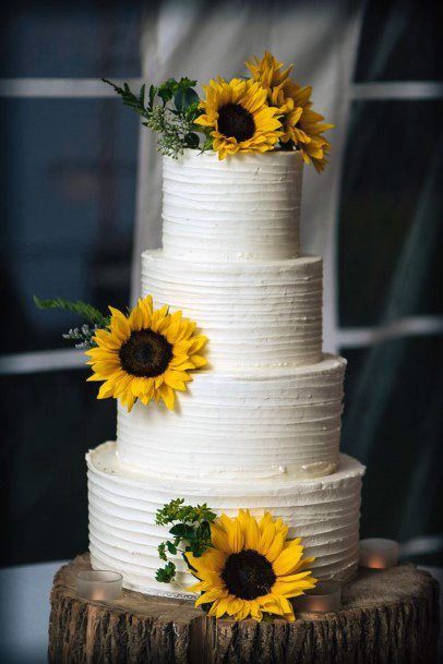 Four Layered White Wedding Cake Women Sunflowers