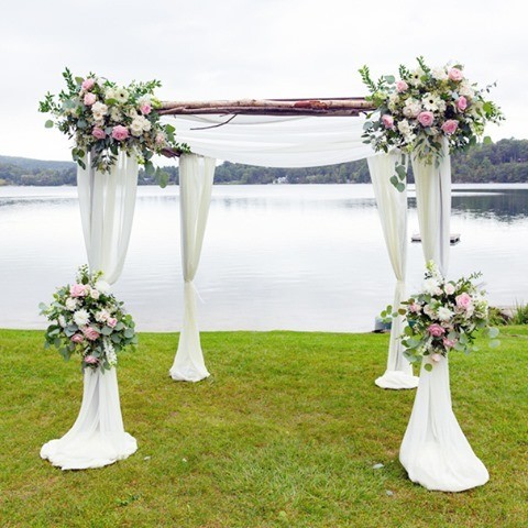 Four Pillared Arch Wedding Flowers White Cloth